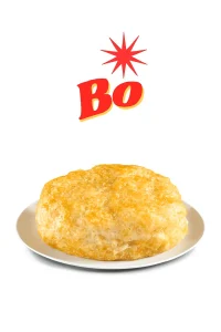 "Plain biscuit on a white plate with the word 'BO' and a red starburst graphic above it."